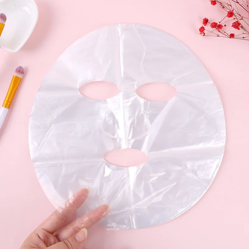 Ultra Thin Plastic Film Facial Mask Skin Care Uncompressed Beauty Salon DIY Promote Products Absorption Disposable Mask 100pcs